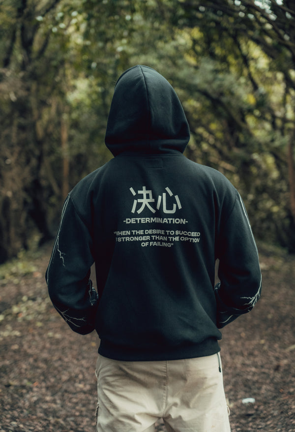 “Determined to succeed” acid wash hoodie